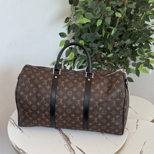 هاندباق Lv حروف بني وأسود